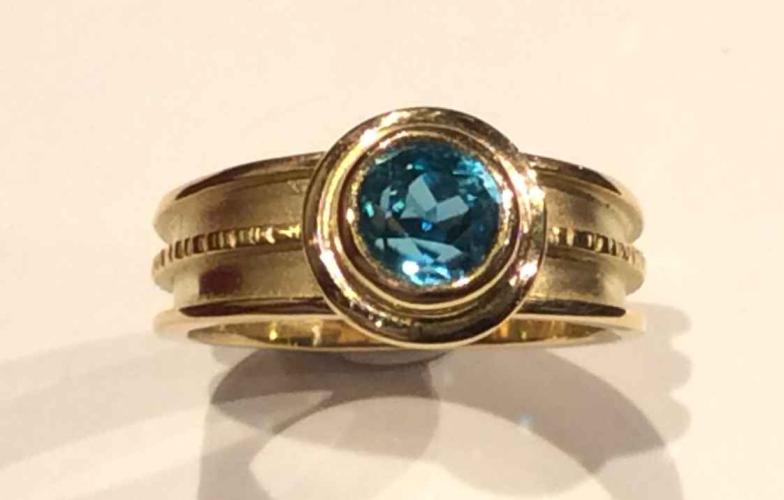 9-10-907 Taper Chip Center Blue Zircon Ring by Ross Coppelman