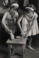 Young Girls at Ballet School, La Scala, putting on shoes,1934 by Alfred Eisenstaedt